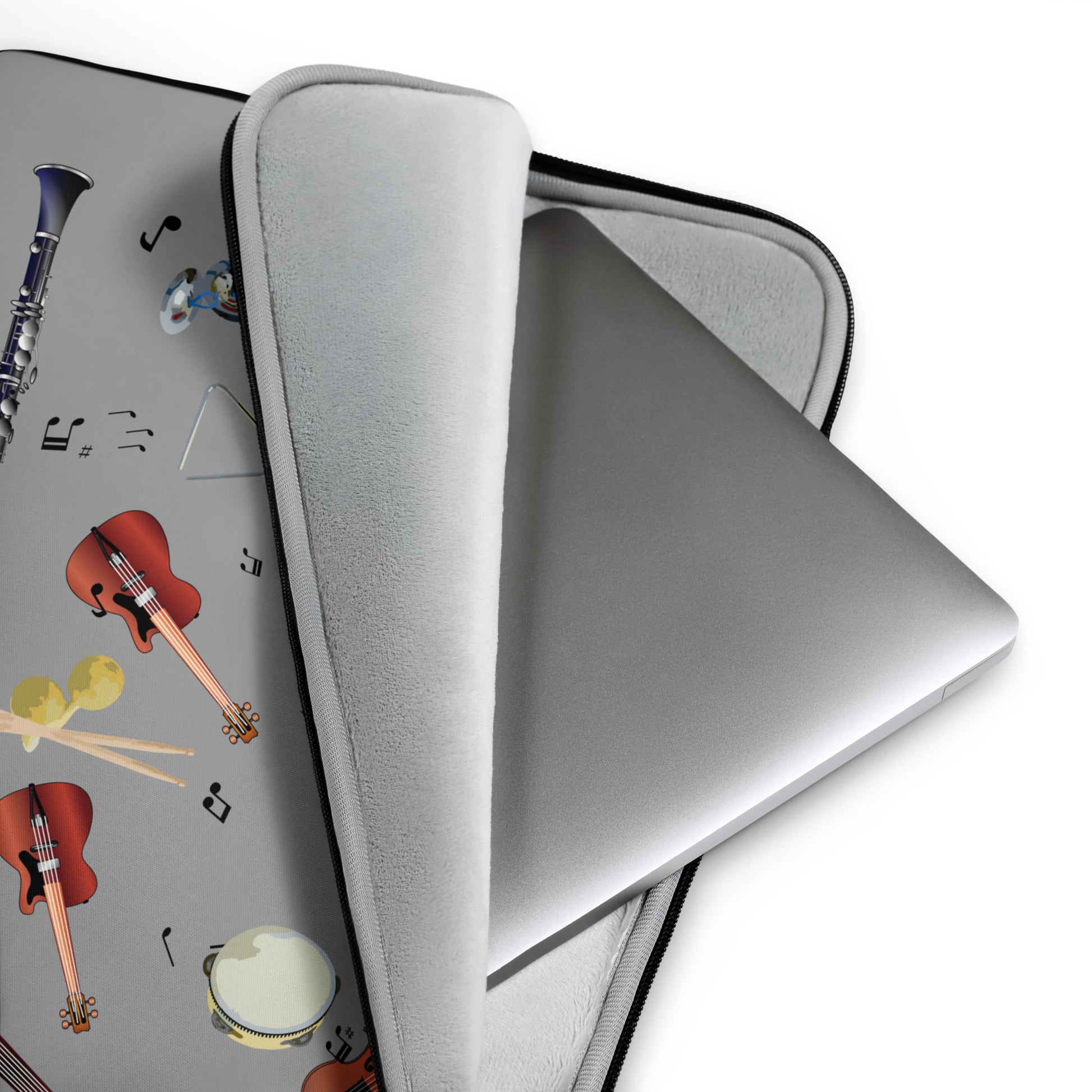 Gray laptop case with musical instrument design on a white background