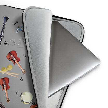 Gray laptop case with musical instrument design on a white background