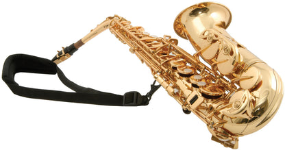 Brass saxophone with a black strap on a white background